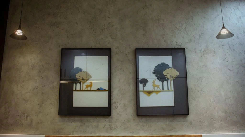 A museum-grade abstract painting in warm bone and ochre tones, hung in soft gallery daylight.